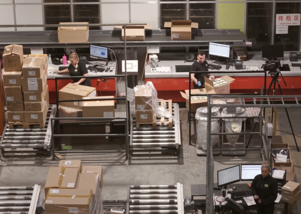 A birdsview of workers working hard at their stations.